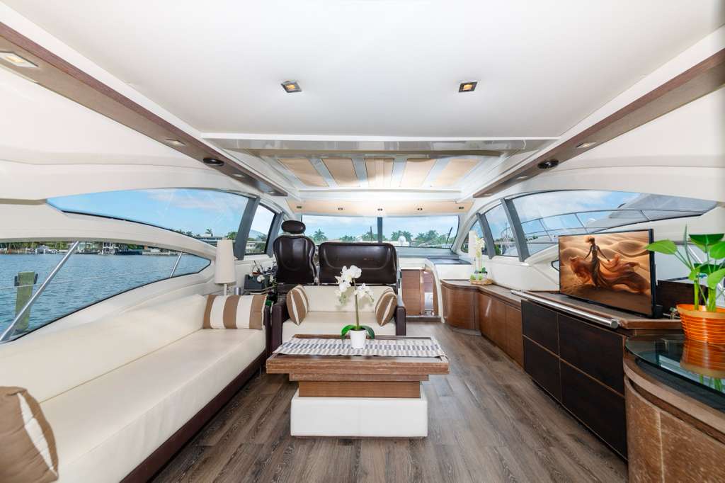 Main salon with panoramic windows aboard Samba Sol